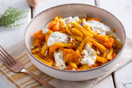 Casarecce with pumpkin, walnuts, and burrata