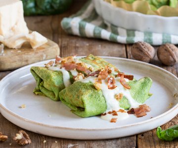 Crepes with pumpkin, speck, and walnuts