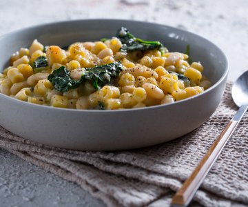 Pasta and beans with black cabbage
