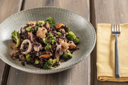 Venere rice with broccoli and seafood
