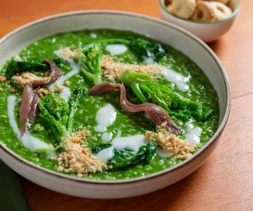 Risotto with turnip tops, anchovies, and garlic sauce