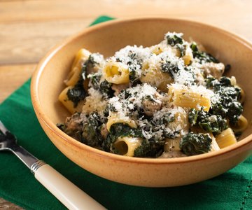 Pasta with sausage and black cabbage