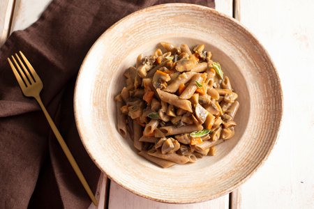 Buckwheat penne with wok mushrooms