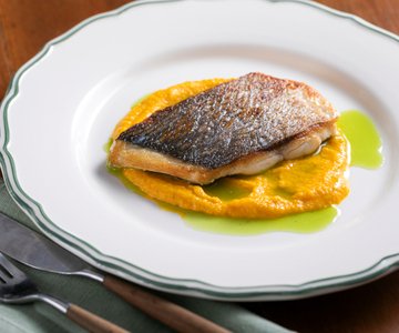 Seared sea bream on carrot cream