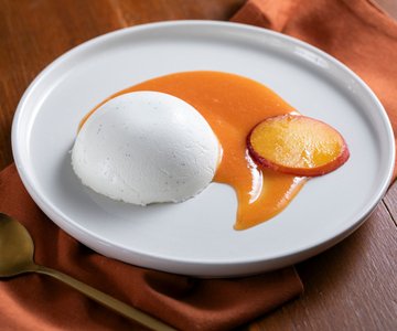 Panna cotta with peach coulis