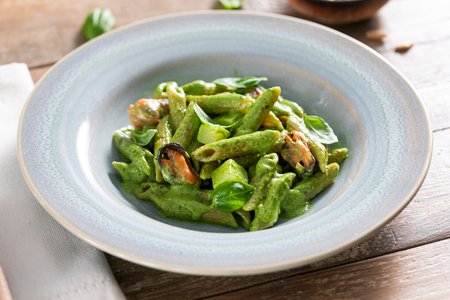 Pasta with pesto, mussels, and potatoes