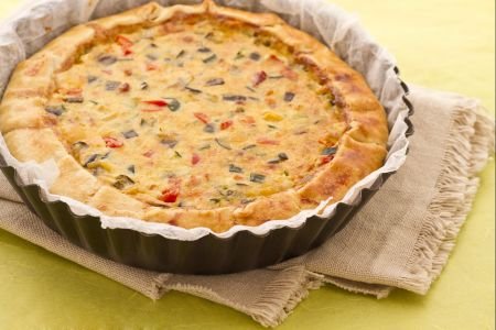 Quiche with vegetables and bacon