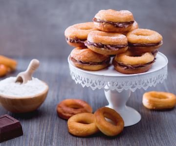 Fried Doughnuts Filled with Chocolate Cream