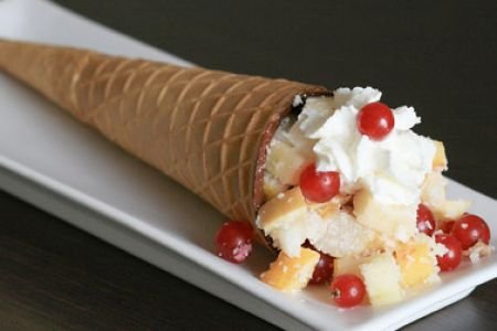 Chocolate cone filled with simple fruit salad