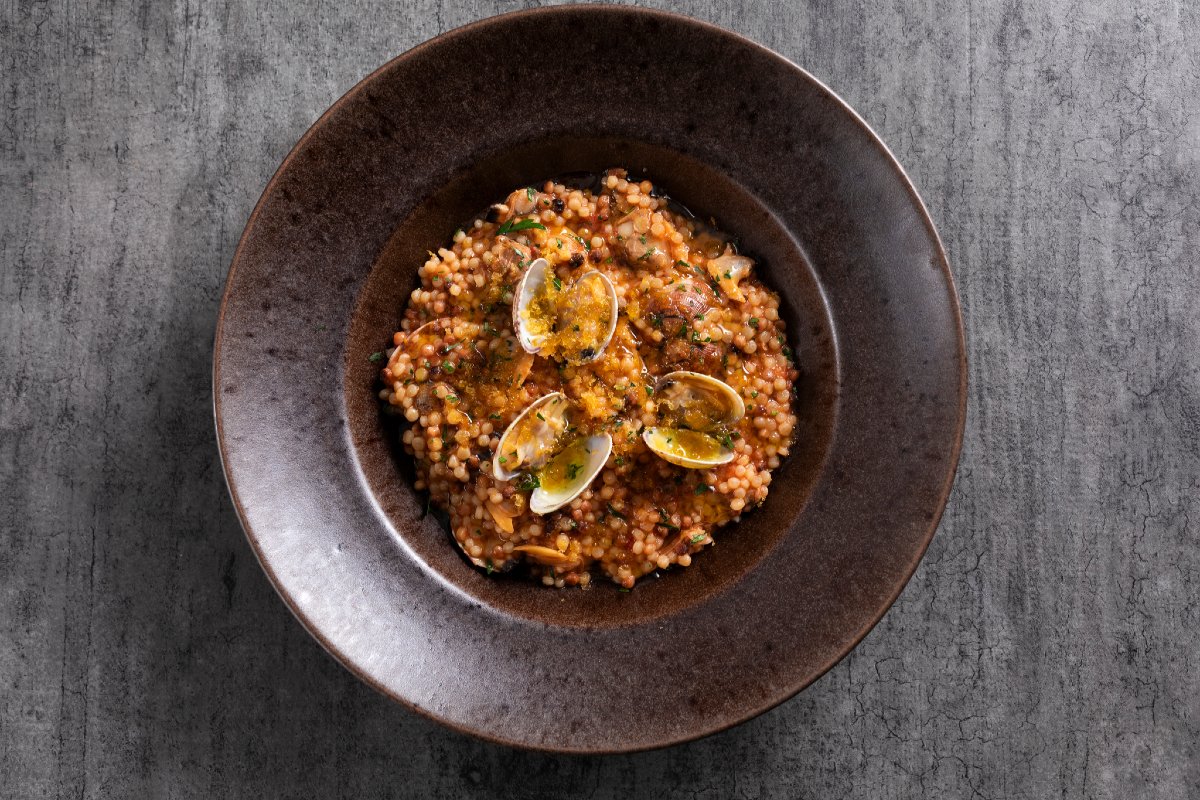 Fregula with clams and bottarga