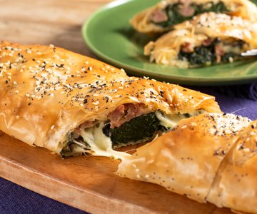 Phyllo pastry strudel with sausage and spinach