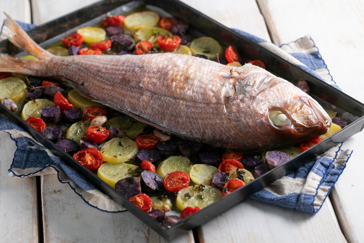Oven-baked red snapper with potatoes