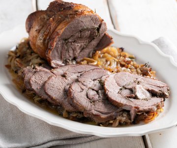 Rolled stuffed lamb