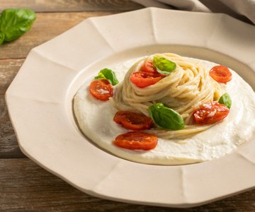 Pasta with eggplant cream and salted ricotta
