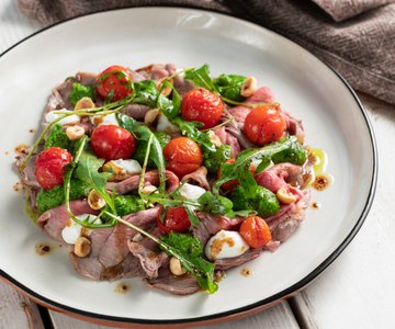 Roast Beef with Arugula Pesto, Cherry Tomatoes, Goat Cheese & Hazelnuts