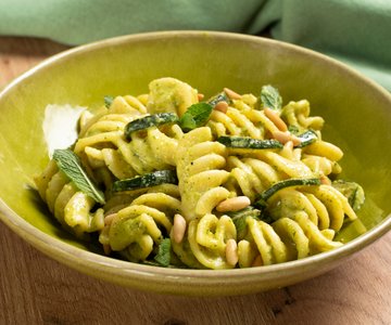 Pasta with zucchini cream and lemon-turmeric goat cheese