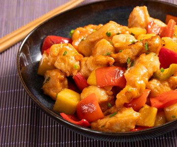 Sweet and sour chicken with peppers and pineapple