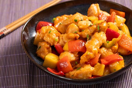 Sweet and sour chicken with peppers and pineapple