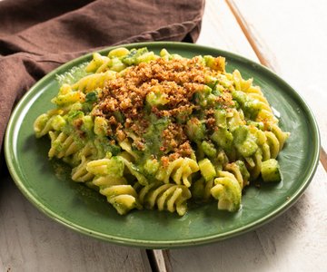 Pasta with creamy zucchini sauce, anchovies and toasted breadcrumbs